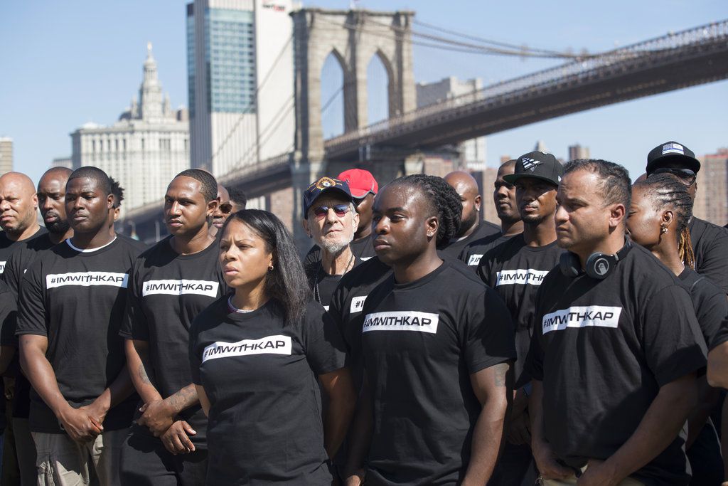 Retired New York City Police Officer Frank Serpico, center, stands with other members of law enforcement during a rally to show support for Colin Kaepernick<br>